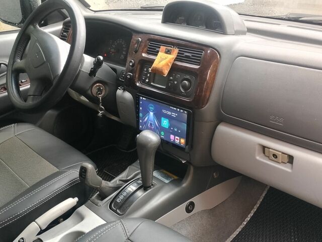 Черный Мицубиси Паджеро Спорт, объемом двигателя 3 л и пробегом 300 тыс. км за 7500 $, фото 9 на Automoto.ua