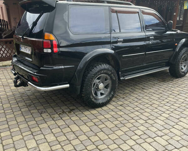 Черный Мицубиси Паджеро Спорт, объемом двигателя 3 л и пробегом 305 тыс. км за 7200 $, фото 5 на Automoto.ua