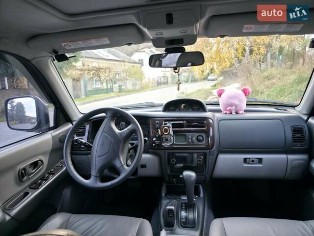 Чорний Міцубісі Паджеро Спорт, об'ємом двигуна 2.97 л та пробігом 126 тис. км за 10500 $, фото 10 на Automoto.ua