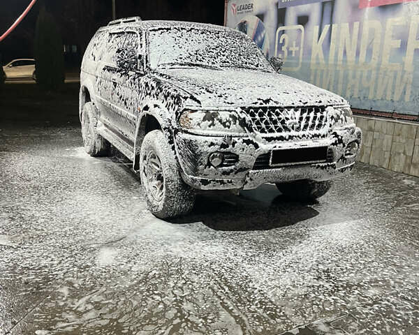 Чорний Міцубісі Паджеро Спорт, об'ємом двигуна 3 л та пробігом 313 тис. км за 6999 $, фото 8 на Automoto.ua