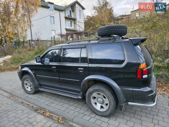 Чорний Міцубісі Паджеро Спорт, об'ємом двигуна 2.97 л та пробігом 126 тис. км за 10500 $, фото 3 на Automoto.ua
