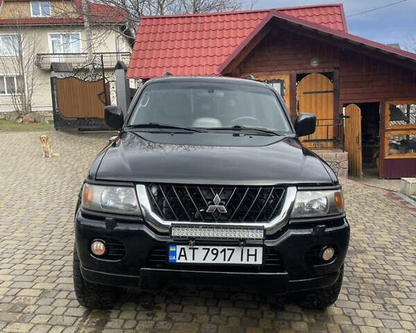Черный Мицубиси Паджеро Спорт, объемом двигателя 3 л и пробегом 305 тыс. км за 7200 $, фото 1 на Automoto.ua