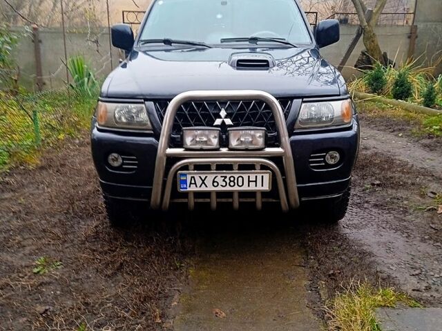 Чорний Міцубісі Паджеро Спорт, об'ємом двигуна 2.5 л та пробігом 207 тис. км за 7000 $, фото 3 на Automoto.ua