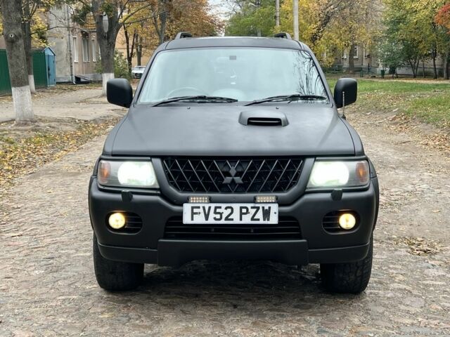 Мицубиси Паджеро Спорт 2003 в Харькове на Automoto.ua Черный Мицубиси Паджеро Спорт, объемом двигателя 2.5 л и пробегом 182 тыс. км за 3500 $, фото 4 на Automoto.ua