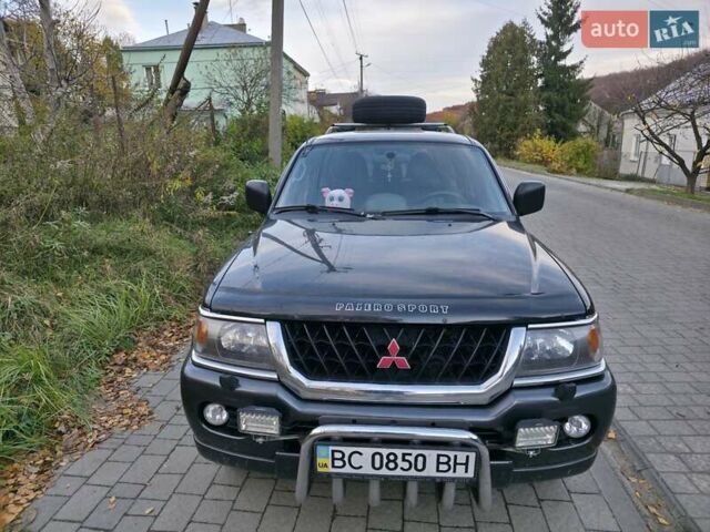 Чорний Міцубісі Паджеро Спорт, об'ємом двигуна 2.97 л та пробігом 126 тис. км за 10500 $, фото 1 на Automoto.ua