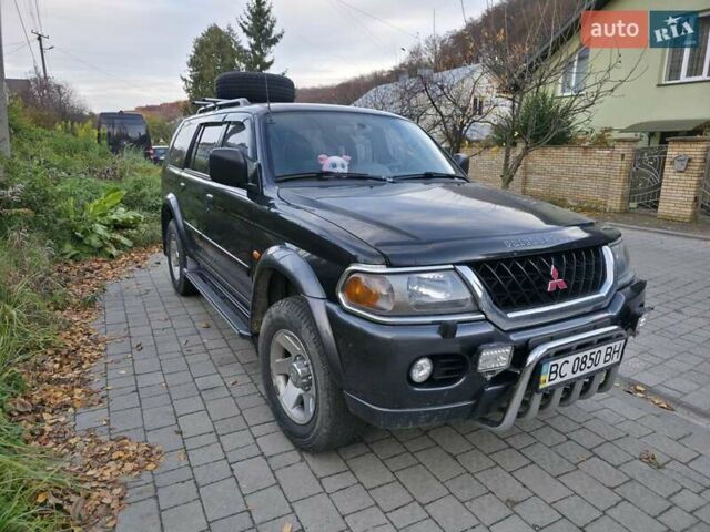 Чорний Міцубісі Паджеро Спорт, об'ємом двигуна 2.97 л та пробігом 126 тис. км за 10500 $, фото 2 на Automoto.ua