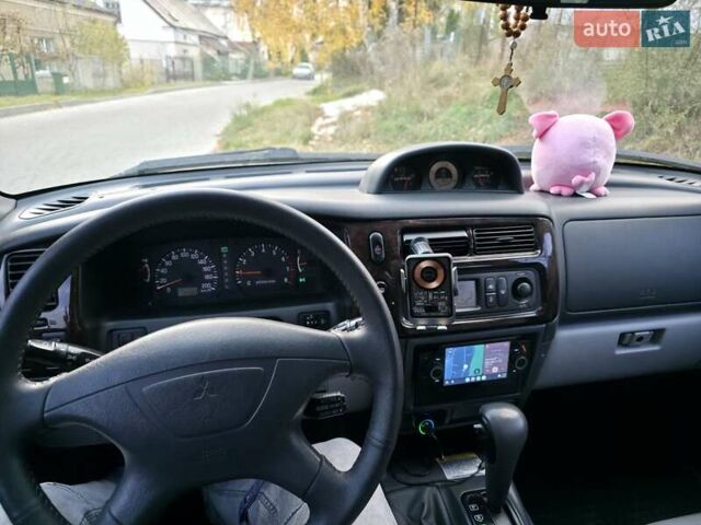 Чорний Міцубісі Паджеро Спорт, об'ємом двигуна 2.97 л та пробігом 126 тис. км за 10500 $, фото 11 на Automoto.ua