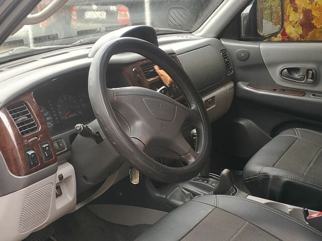 Черный Мицубиси Паджеро Спорт, объемом двигателя 3 л и пробегом 300 тыс. км за 7500 $, фото 7 на Automoto.ua