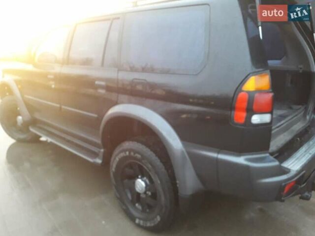 Черный Мицубиси Паджеро Спорт, объемом двигателя 2.97 л и пробегом 290 тыс. км за 9500 $, фото 3 на Automoto.ua