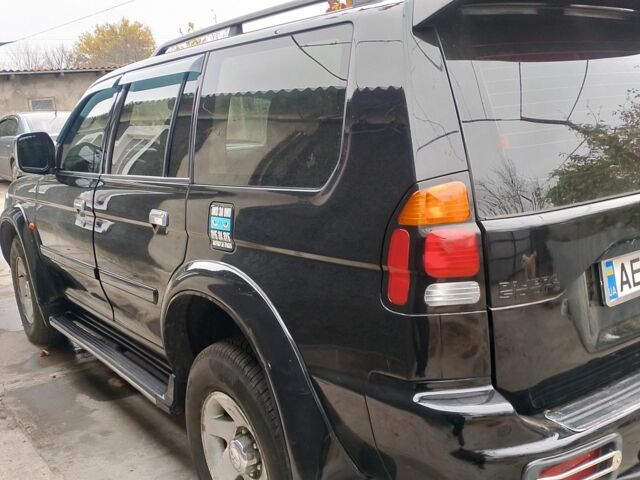 Черный Мицубиси Паджеро Спорт, объемом двигателя 3 л и пробегом 300 тыс. км за 7500 $, фото 4 на Automoto.ua