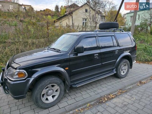 Чорний Міцубісі Паджеро Спорт, об'ємом двигуна 2.97 л та пробігом 126 тис. км за 10500 $, фото 4 на Automoto.ua