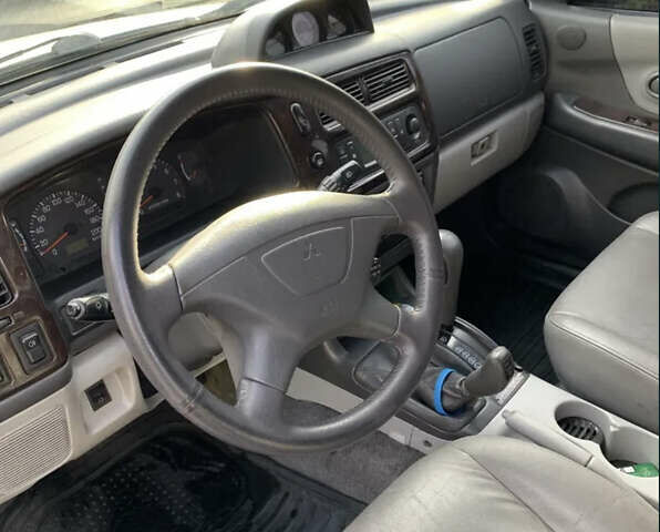 Черный Мицубиси Паджеро Спорт, объемом двигателя 3 л и пробегом 305 тыс. км за 7200 $, фото 8 на Automoto.ua