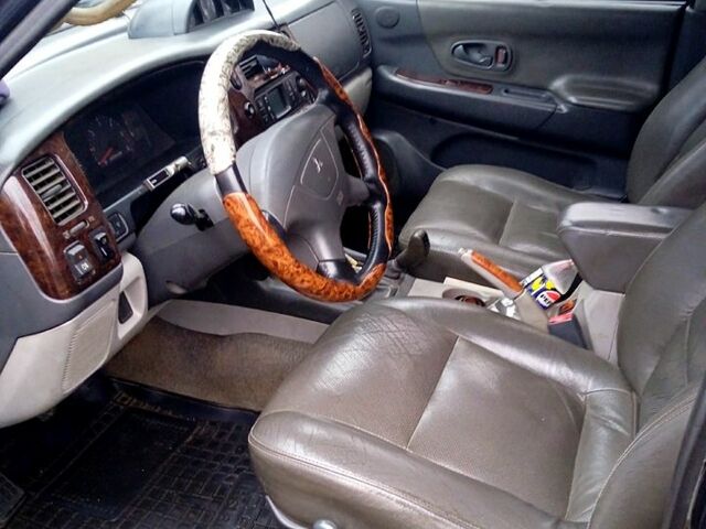 Чорний Міцубісі Паджеро Спорт, об'ємом двигуна 2.5 л та пробігом 207 тис. км за 7000 $, фото 4 на Automoto.ua