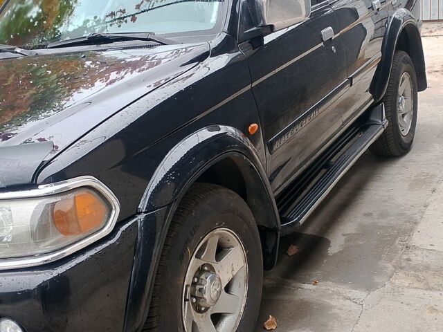 Черный Мицубиси Паджеро Спорт, объемом двигателя 3 л и пробегом 300 тыс. км за 7500 $, фото 1 на Automoto.ua