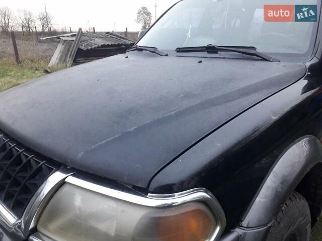 Черный Мицубиси Паджеро Спорт, объемом двигателя 2.97 л и пробегом 290 тыс. км за 9500 $, фото 5 на Automoto.ua