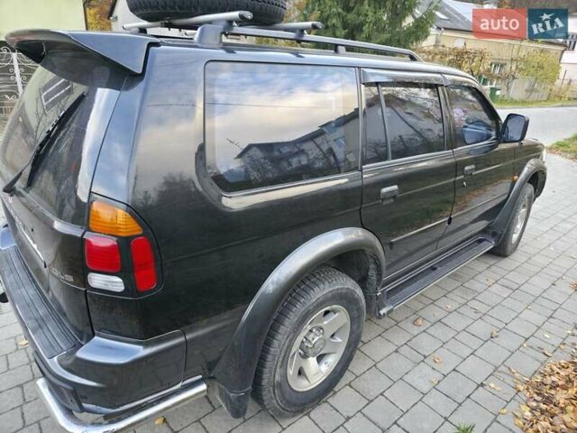 Чорний Міцубісі Паджеро Спорт, об'ємом двигуна 2.97 л та пробігом 126 тис. км за 10500 $, фото 6 на Automoto.ua