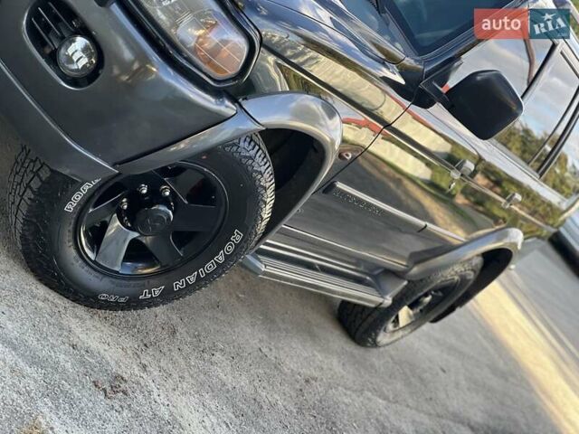 Черный Мицубиси Паджеро Спорт, объемом двигателя 3 л и пробегом 430 тыс. км за 9777 $, фото 3 на Automoto.ua