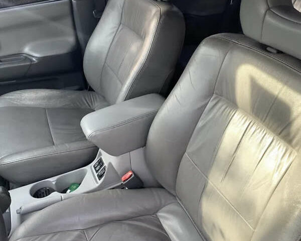 Черный Мицубиси Паджеро Спорт, объемом двигателя 3 л и пробегом 305 тыс. км за 7200 $, фото 9 на Automoto.ua