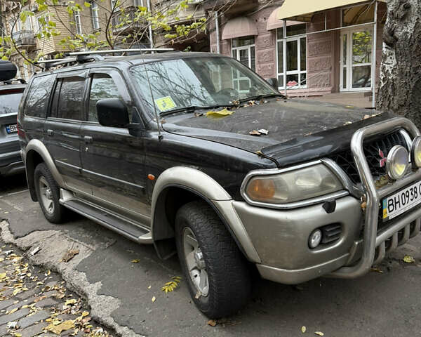 Черный Мицубиси Паджеро Спорт, объемом двигателя 2.97 л и пробегом 290 тыс. км за 7200 $, фото 2 на Automoto.ua