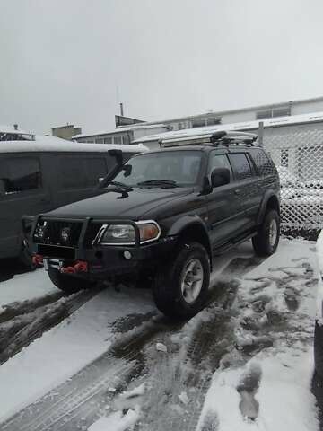 Черный Мицубиси Паджеро Спорт, объемом двигателя 3 л и пробегом 370 тыс. км за 10500 $, фото 5 на Automoto.ua