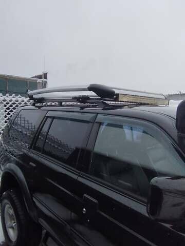 Черный Мицубиси Паджеро Спорт, объемом двигателя 3 л и пробегом 370 тыс. км за 10500 $, фото 4 на Automoto.ua