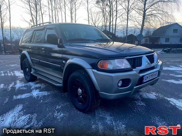 Черный Мицубиси Паджеро Спорт, объемом двигателя 3 л и пробегом 311 тыс. км за 6899 $, фото 5 на Automoto.ua