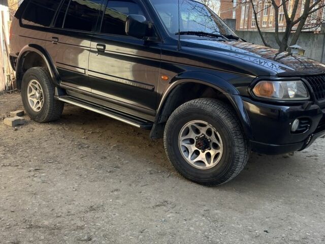 Чорний Міцубісі Паджеро Спорт, об'ємом двигуна 3 л та пробігом 313 тис. км за 6900 $, фото 4 на Automoto.ua