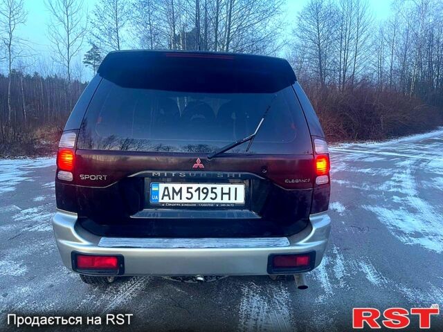 Черный Мицубиси Паджеро Спорт, объемом двигателя 3 л и пробегом 311 тыс. км за 6899 $, фото 3 на Automoto.ua