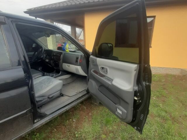 Черный Мицубиси Паджеро Спорт, объемом двигателя 3 л и пробегом 230 тыс. км за 8000 $, фото 4 на Automoto.ua