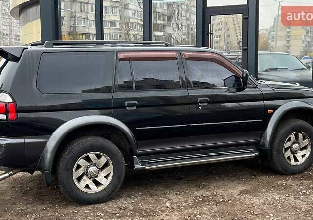 Черный Мицубиси Паджеро Спорт, объемом двигателя 3 л и пробегом 239 тыс. км за 7790 $, фото 5 на Automoto.ua