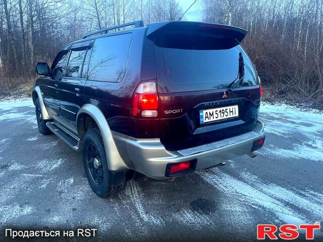 Черный Мицубиси Паджеро Спорт, объемом двигателя 3 л и пробегом 311 тыс. км за 6899 $, фото 9 на Automoto.ua