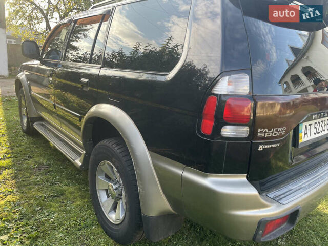 Черный Мицубиси Паджеро Спорт, объемом двигателя 3 л и пробегом 244 тыс. км за 7800 $, фото 24 на Automoto.ua