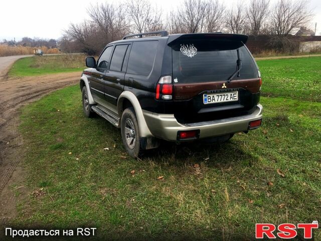 Чорний Міцубісі Паджеро Спорт, об'ємом двигуна 3 л та пробігом 383 тис. км за 7000 $, фото 6 на Automoto.ua
