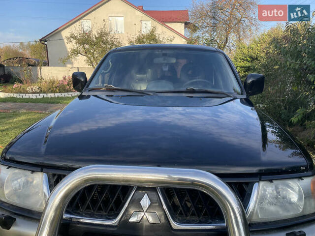 Черный Мицубиси Паджеро Спорт, объемом двигателя 3 л и пробегом 244 тыс. км за 7800 $, фото 19 на Automoto.ua