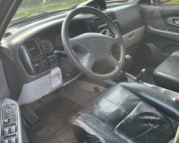 Черный Мицубиси Паджеро Спорт, объемом двигателя 3 л и пробегом 244 тыс. км за 7800 $, фото 10 на Automoto.ua