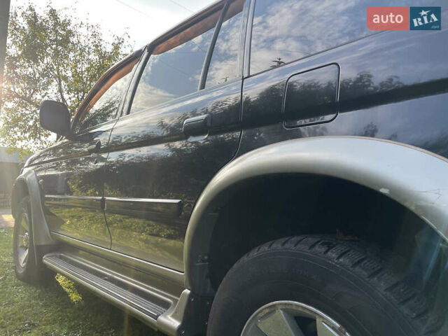 Черный Мицубиси Паджеро Спорт, объемом двигателя 3 л и пробегом 244 тыс. км за 7800 $, фото 23 на Automoto.ua