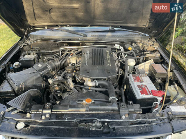 Черный Мицубиси Паджеро Спорт, объемом двигателя 3 л и пробегом 244 тыс. км за 7800 $, фото 9 на Automoto.ua