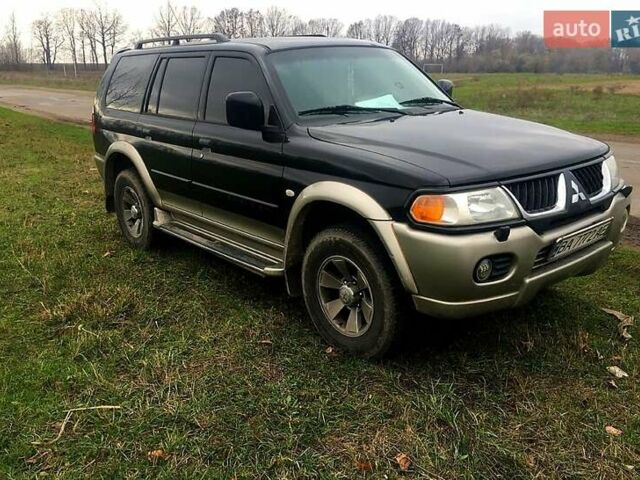 Черный Мицубиси Паджеро Спорт, объемом двигателя 3 л и пробегом 383 тыс. км за 7000 $, фото 2 на Automoto.ua