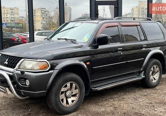 Черный Мицубиси Паджеро Спорт, объемом двигателя 3 л и пробегом 239 тыс. км за 7790 $, фото 2 на Automoto.ua