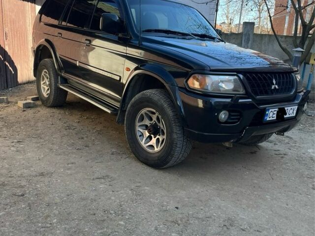 Чорний Міцубісі Паджеро Спорт, об'ємом двигуна 3 л та пробігом 313 тис. км за 6900 $, фото 5 на Automoto.ua