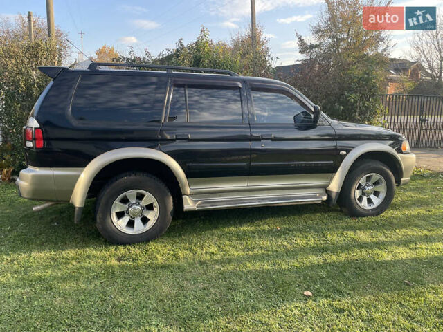 Черный Мицубиси Паджеро Спорт, объемом двигателя 3 л и пробегом 244 тыс. км за 7800 $, фото 31 на Automoto.ua