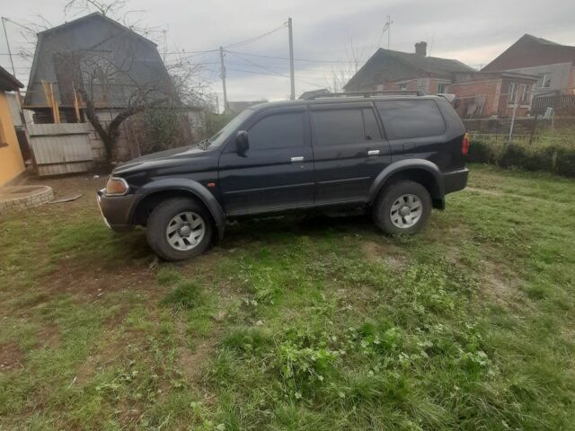 Черный Мицубиси Паджеро Спорт, объемом двигателя 3 л и пробегом 230 тыс. км за 8000 $, фото 2 на Automoto.ua