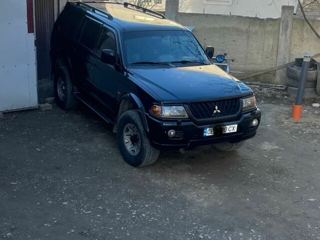 Чорний Міцубісі Паджеро Спорт, об'ємом двигуна 3 л та пробігом 313 тис. км за 6900 $, фото 3 на Automoto.ua