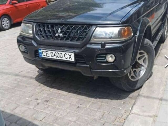 Чорний Міцубісі Паджеро Спорт, об'ємом двигуна 3 л та пробігом 313 тис. км за 6900 $, фото 9 на Automoto.ua