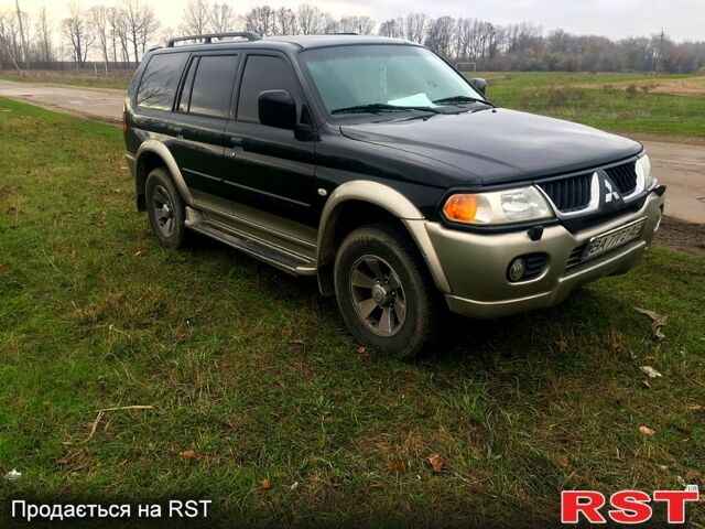 Чорний Міцубісі Паджеро Спорт, об'ємом двигуна 3 л та пробігом 383 тис. км за 7000 $, фото 1 на Automoto.ua