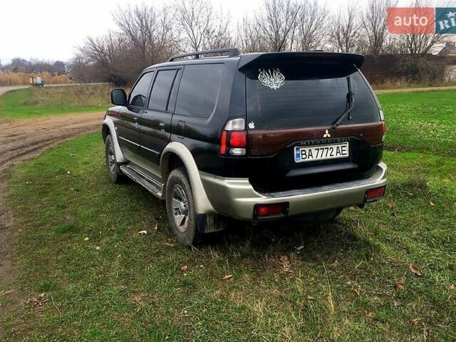 Черный Мицубиси Паджеро Спорт, объемом двигателя 3 л и пробегом 383 тыс. км за 7000 $, фото 5 на Automoto.ua