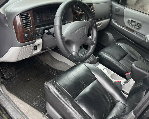 Черный Мицубиси Паджеро Спорт, объемом двигателя 3 л и пробегом 300 тыс. км за 5300 $, фото 10 на Automoto.ua