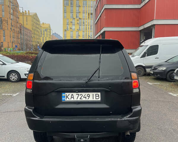 Черный Мицубиси Паджеро Спорт, объемом двигателя 3 л и пробегом 300 тыс. км за 5300 $, фото 3 на Automoto.ua