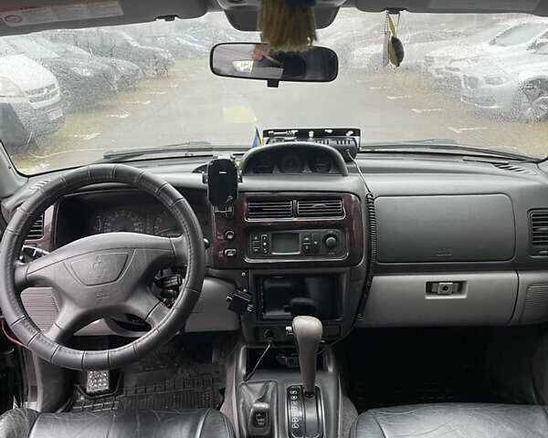 Черный Мицубиси Паджеро Спорт, объемом двигателя 3 л и пробегом 300 тыс. км за 5300 $, фото 8 на Automoto.ua