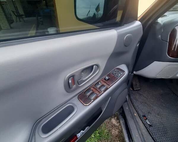 Чорний Міцубісі Паджеро Спорт, об'ємом двигуна 3 л та пробігом 230 тис. км за 8000 $, фото 5 на Automoto.ua